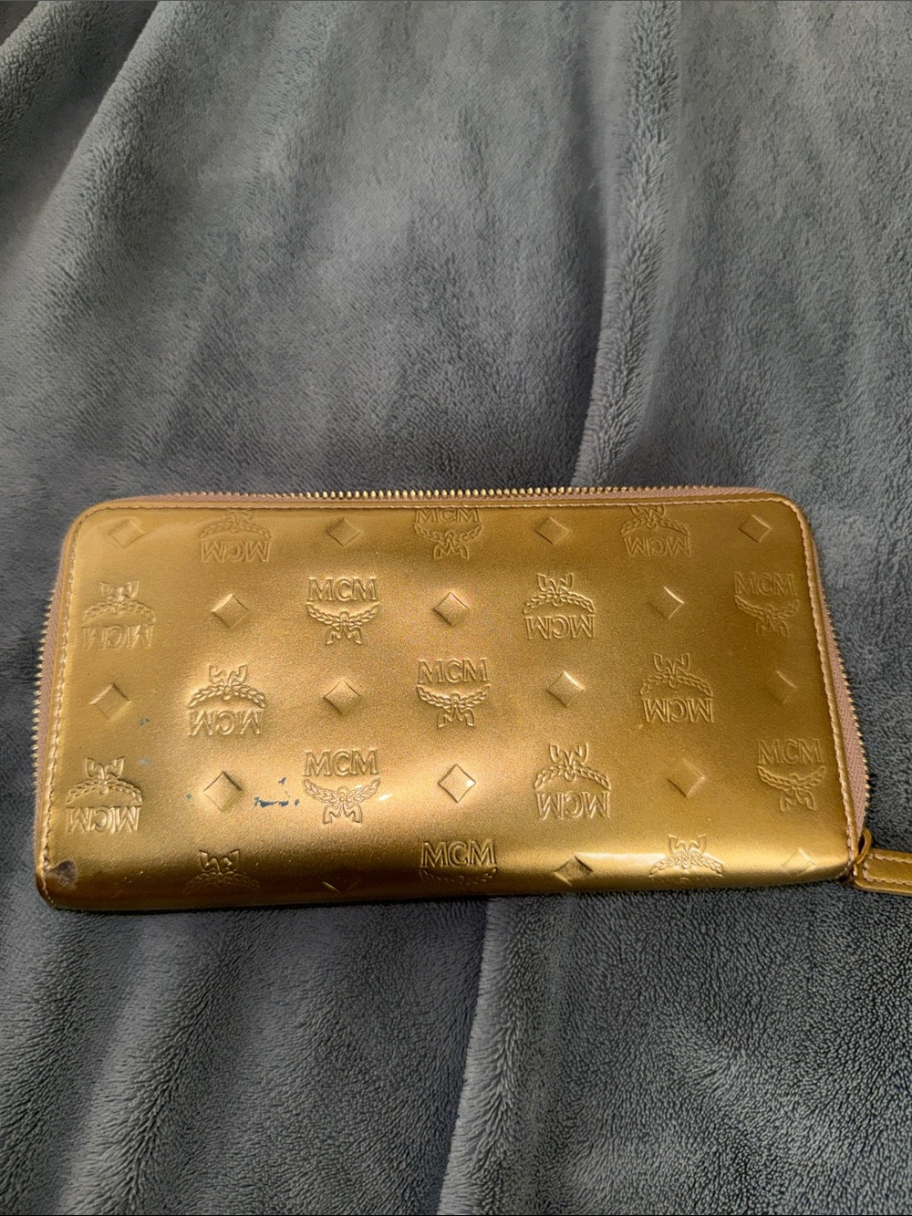 MCM Metallic Gold Embossed Logo Zip Wallet